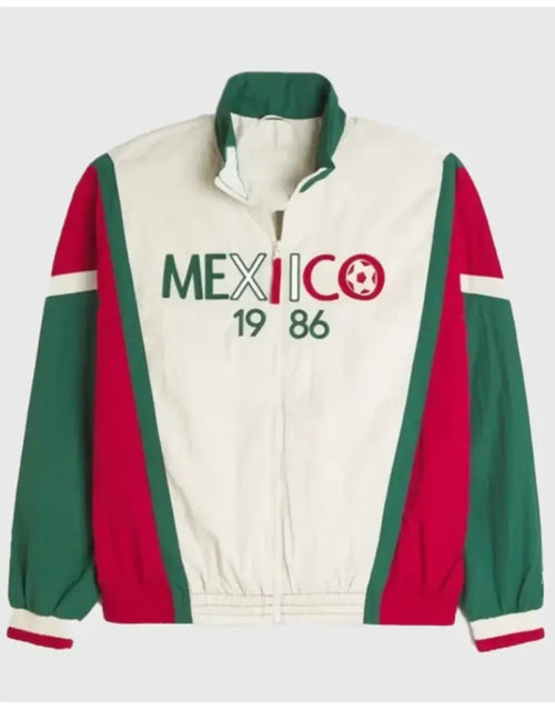 Cream-colored jacket with green and red accents featuring 'MEXICO 1986' text and soccer ball graphic.
