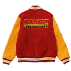 Red and yellow jacket with 'Michael Jackson A Bathing Ape' text on a white background