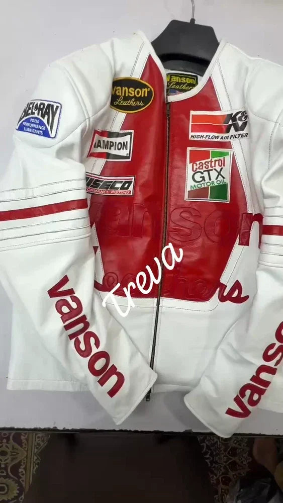 White and red racing jacket with various sponsor logos on a hanger.