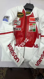 White and red racing jacket with various sponsor logos on a hanger.
