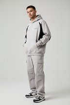 Male model wearing Premium Colorblock Logo Hoodie
