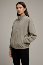 The Architect Stone Suede Bomber Jacket – Female Model